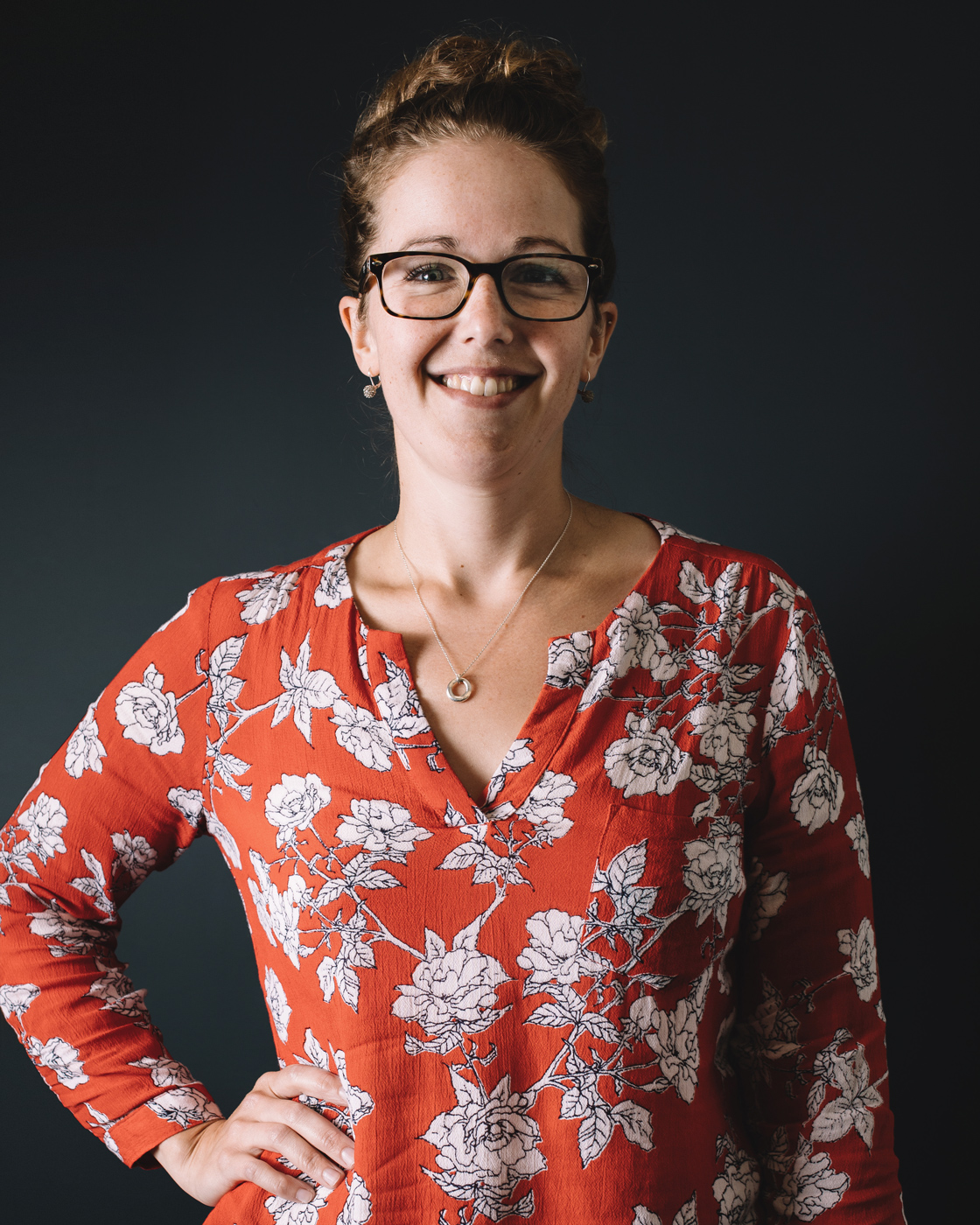 Smile of a designer at Chez Koop in Steinbach Manitoba, specializing in creative branding and web design.