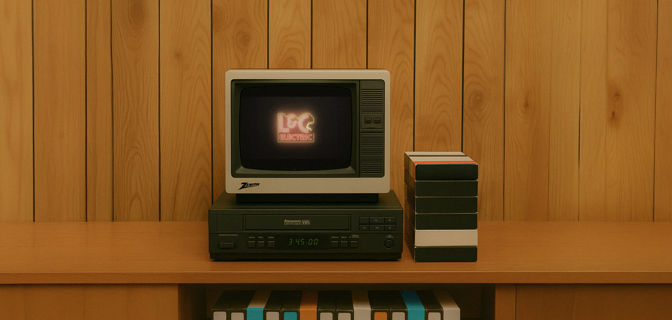Retro TV and VHS setup showcasing L&C Electric logo – designed by Chez Koop, Steinbach Manitoba creative studio