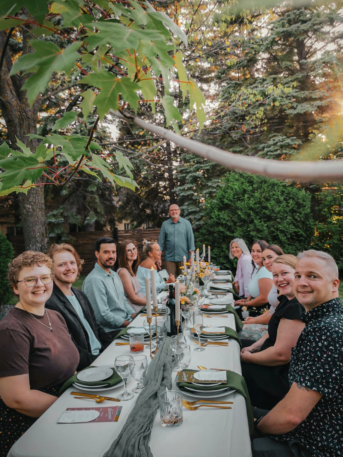 Chez Koop branding celebration dinner with team in Steinbach Manitoba – creative studio bonding moment