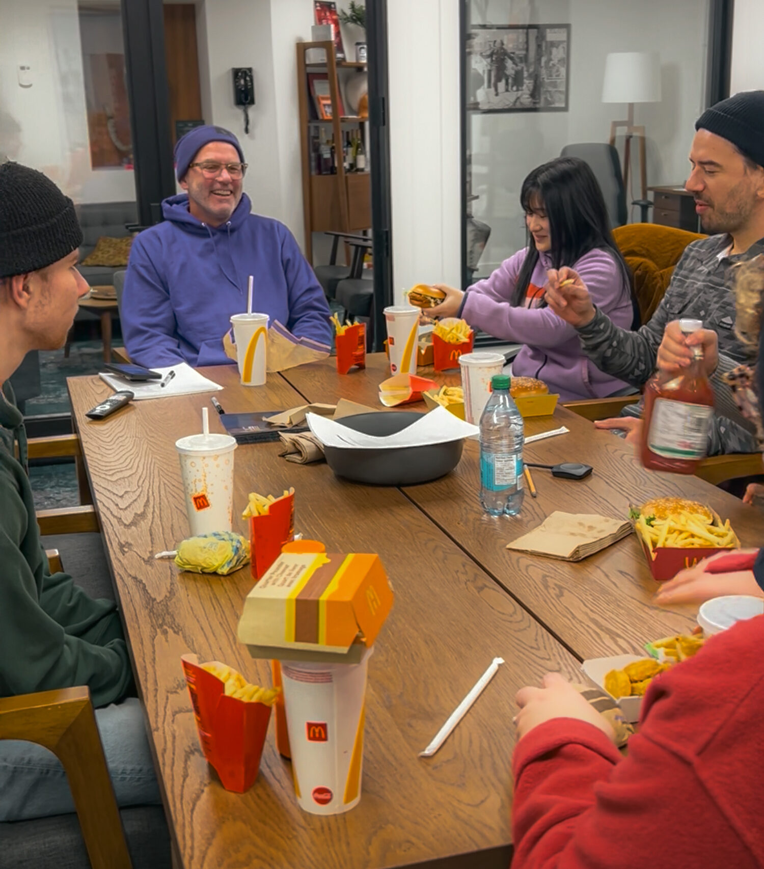 Team brainstorming over lunch at Chez Koop – Steinbach Manitoba creative design studio